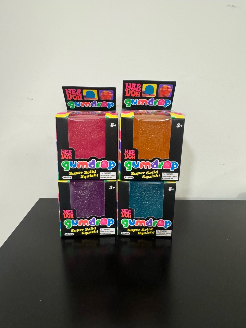 Set of 4 brand new Needoh Gumdrop pink, orange purple blue
